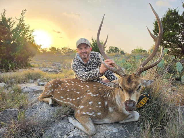 Josh Moriarity with trophy Axis deer